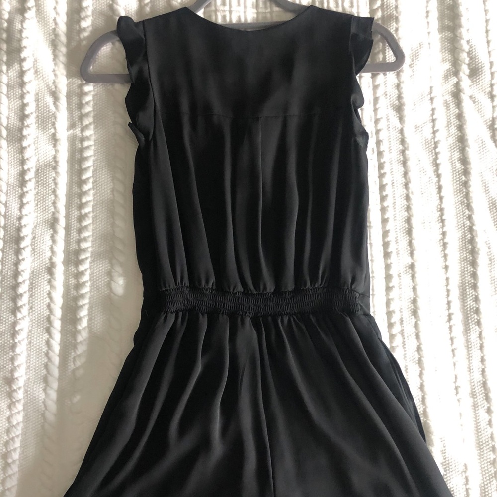 Black Ruffled Romper with Front Zipper - Picture 2 of 5